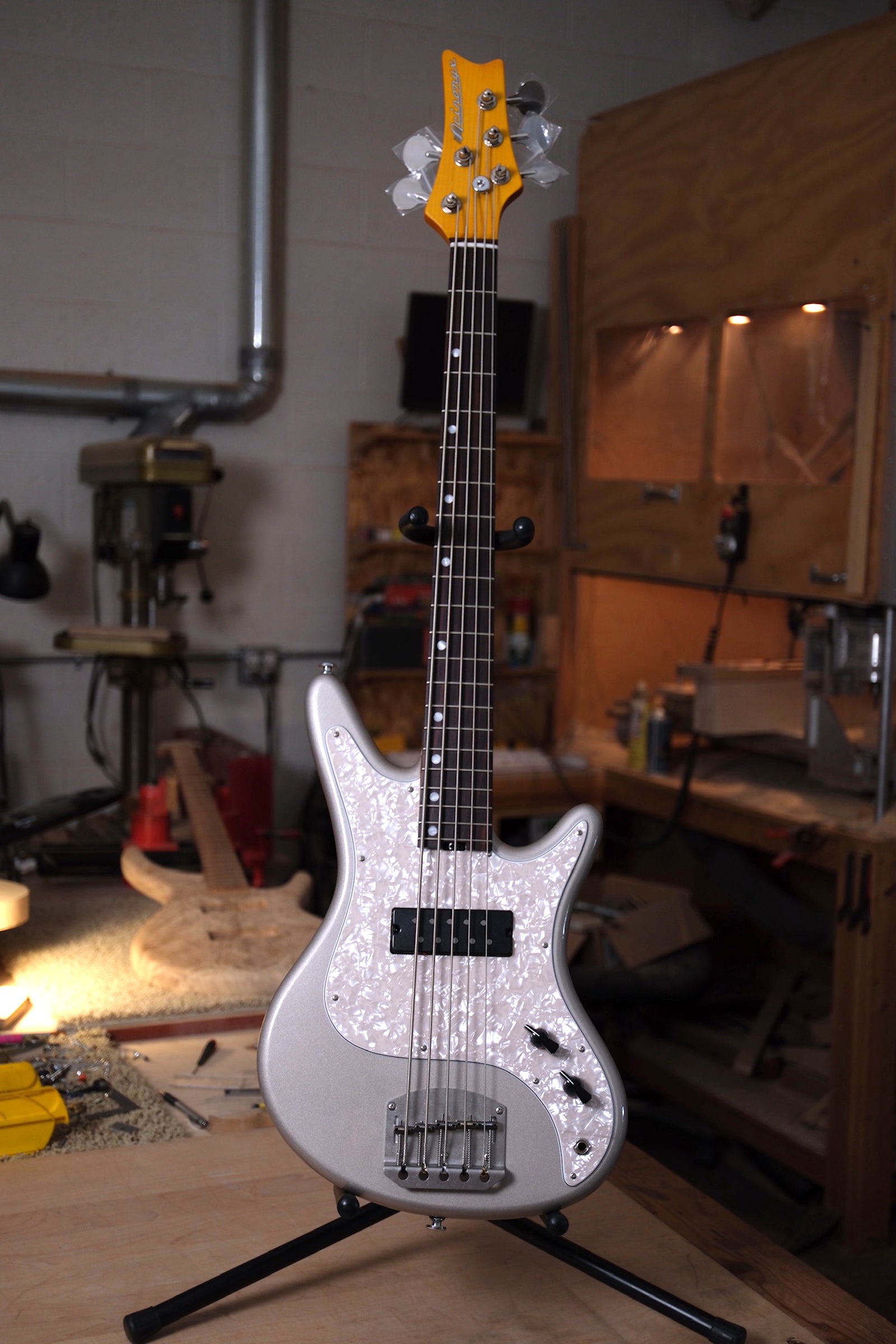 full bass photo of the Acinonyx V Short Scale Bass Guitar - Inca Silver showing the neck with the side dots on the bass side