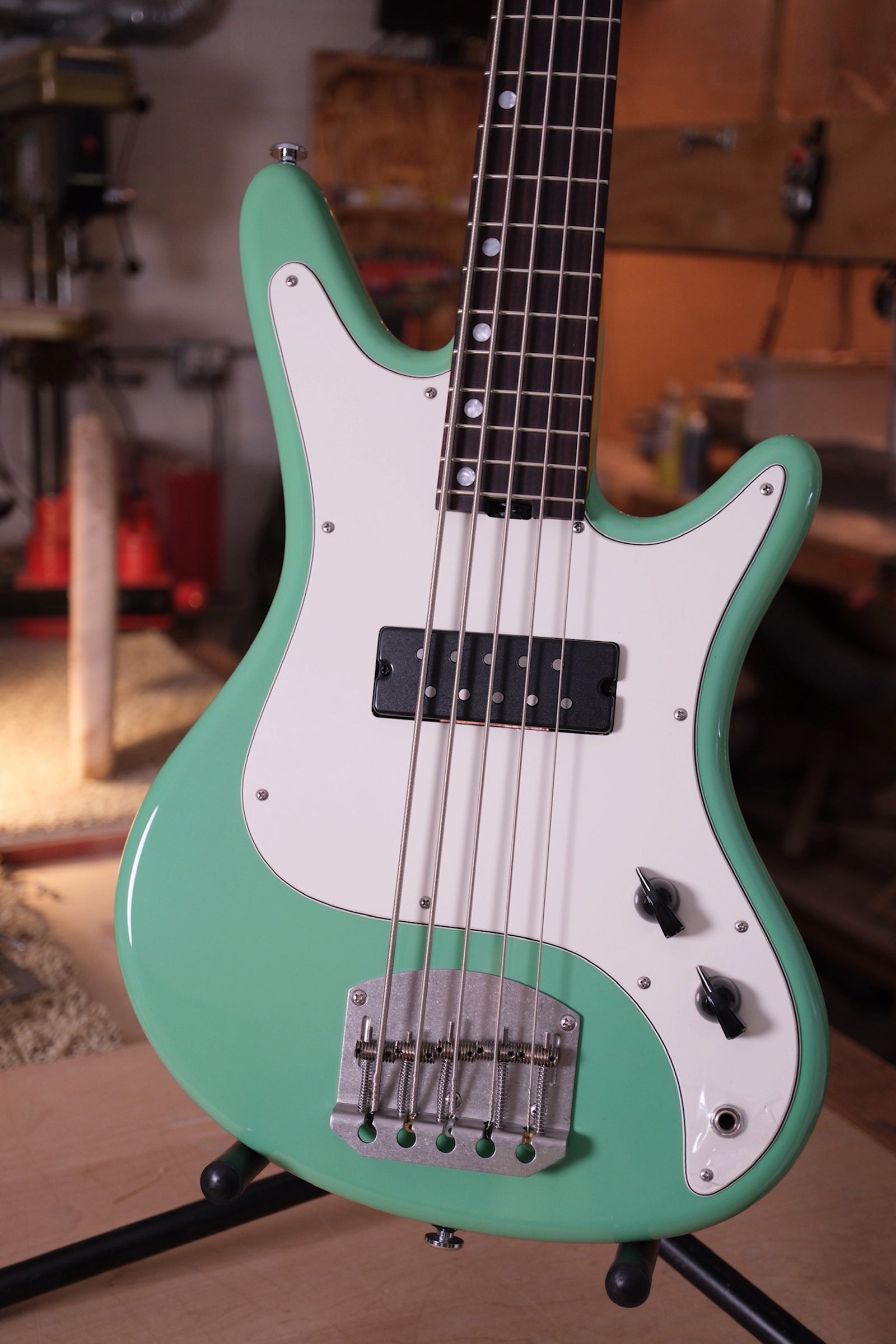 front body of the Acinonyx V Short Scale Bass Guitar - Seafoam Green showing the single polyvox pickup