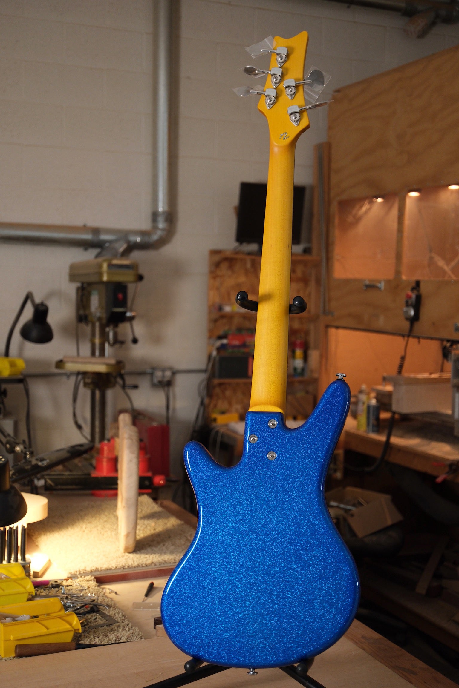 full back photo of Acinonyx V Short Scale Bass Guitar - Championship Sparkle Blue showing the 3 bolt connection