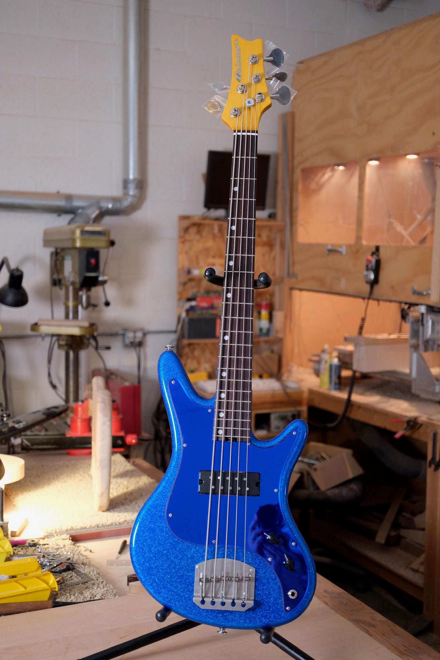 full front photo of the Acinonyx V Short Scale Bass Guitar - Championship Sparkle Blue