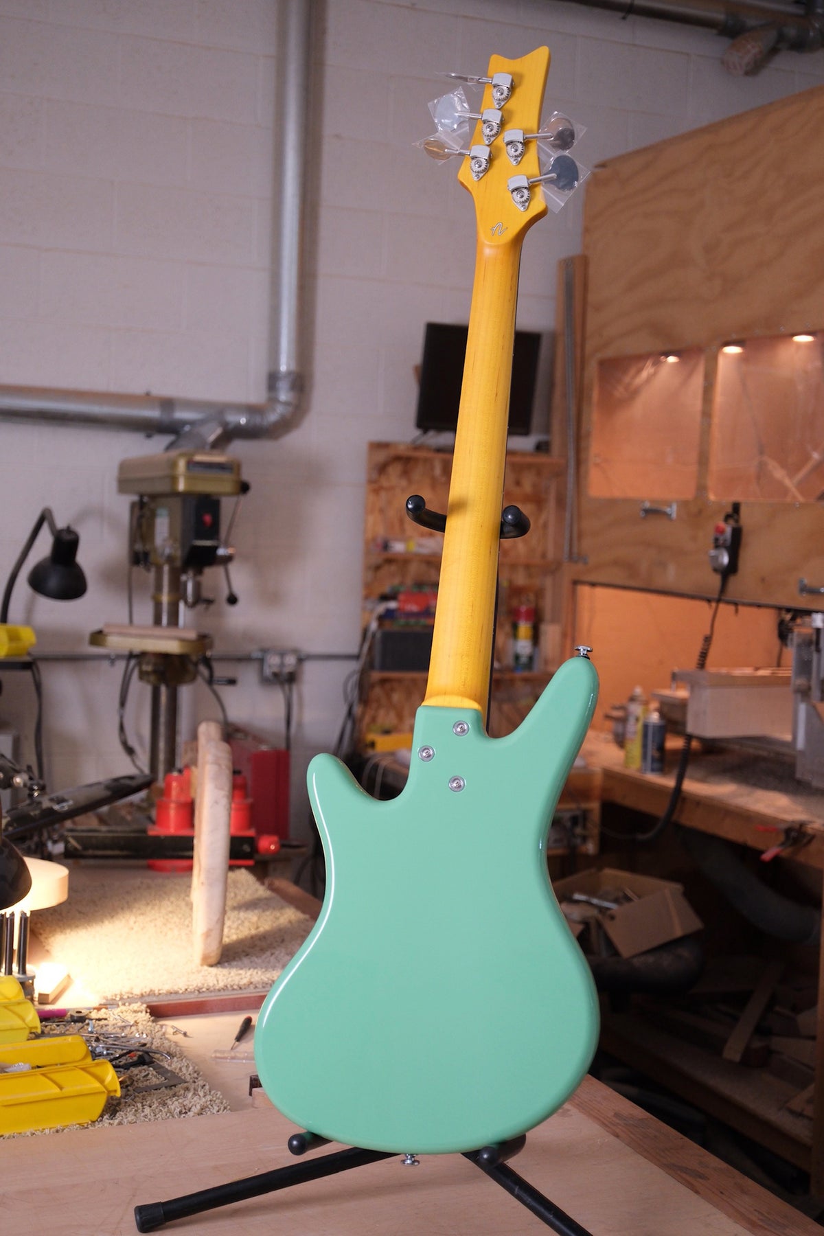 full photo of the back of the Acinonyx V Short Scale Bass Guitar - Seafoam Green showing the 3 bolt neck connection