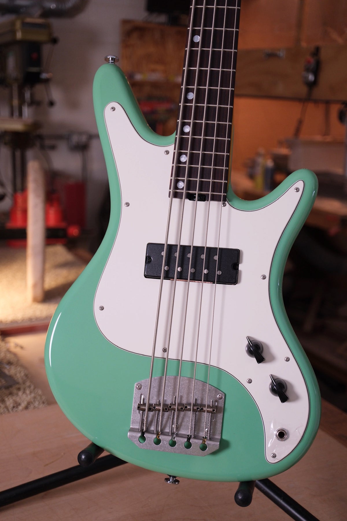 front body of the Acinonyx V Short Scale Bass Guitar - Seafoam Green showing the single polyvox pickup