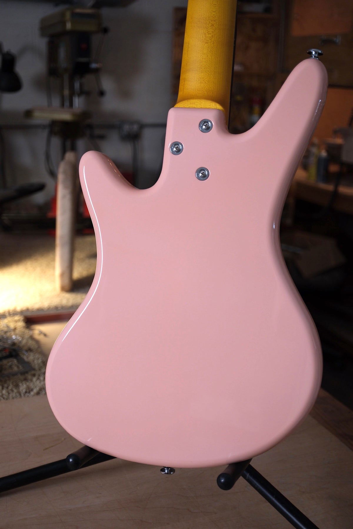 photo of the back of the body of the Acinonyx V Short Scale Bass Guitar - Shell Pink