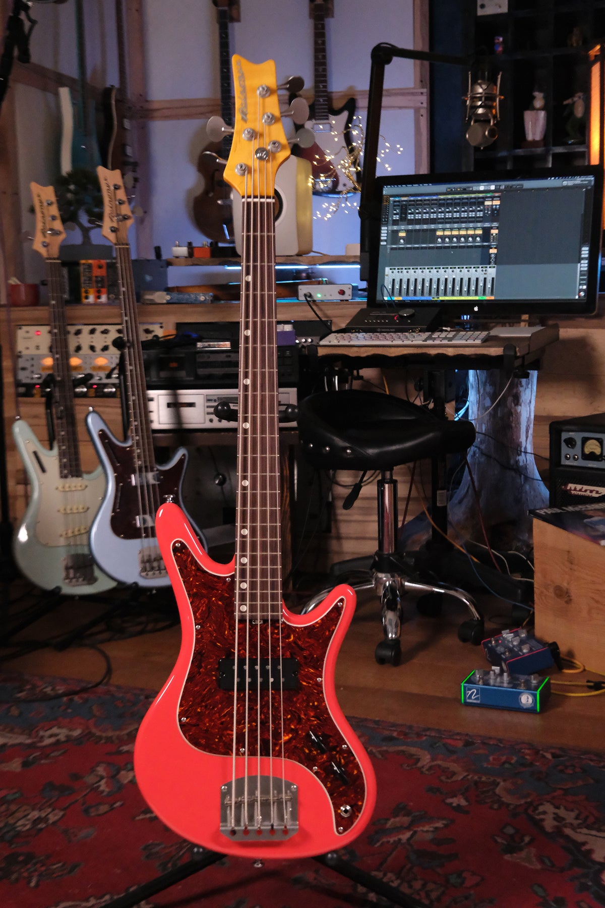 Full front view of the Acinonyx V - Fiesta Red bass guitar