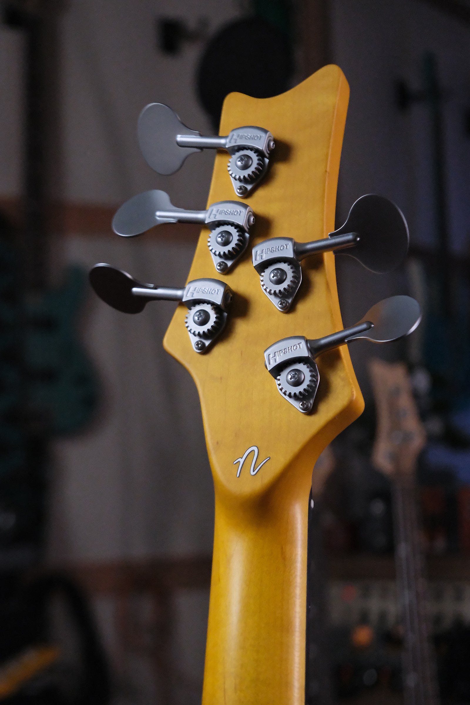 close up view of the back of the headstock for the Acinonyx V - Surf Green