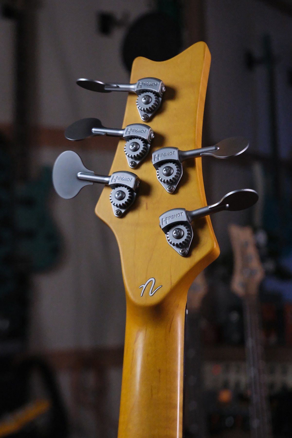 back view of the headstock of the Acinonyx V bass guitar