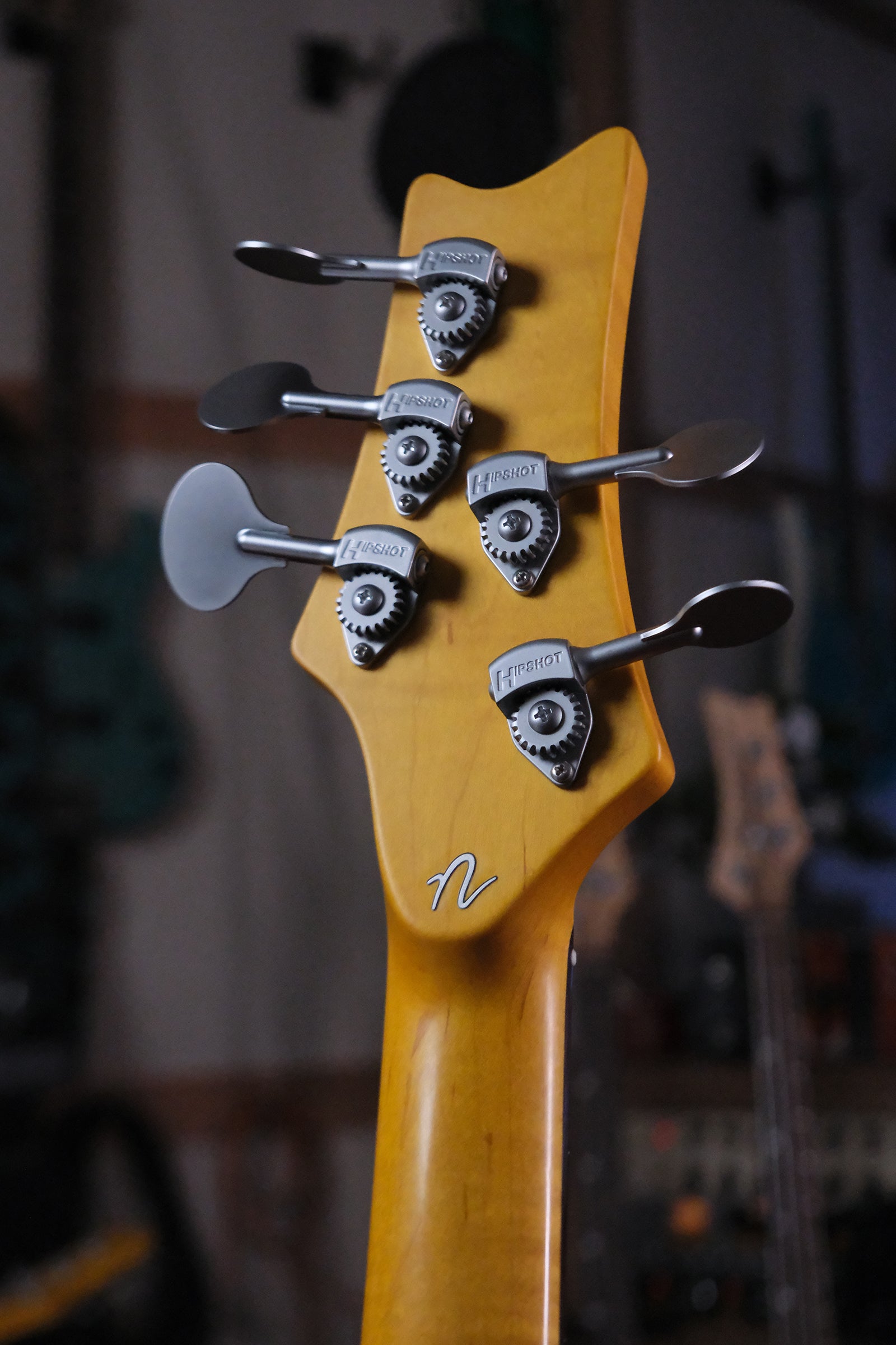 back view of the headstock of the Acinonyx V bass guitar