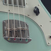 view of vintage bridge on Nordstrand Acinonyx bass with Surf Green finish