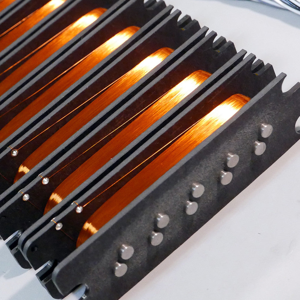 Side view showing coils of pickups without covers