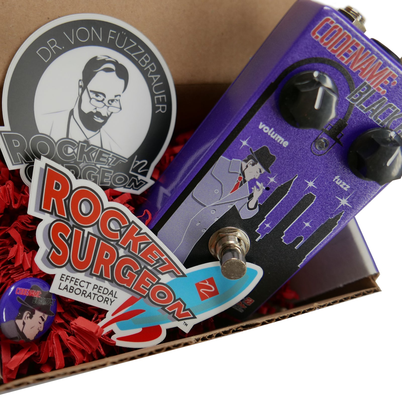 View of Nordstrand Rocket Surgeon Blackhat Fuzz Effect Guitar Pedal with accessories and packaging